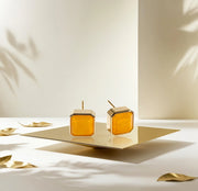 Bold Box Studs featuring 10mm Sunlit Quartz in Asscher cut.